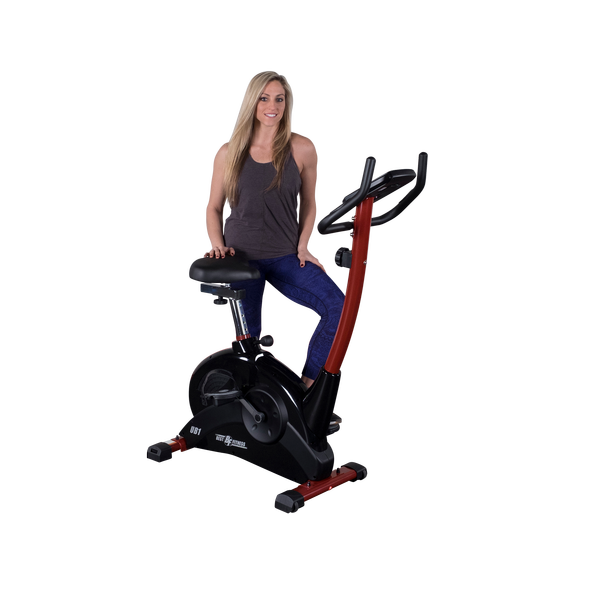 Female cyclist standing behind the Best Fitness BFUB1 Upright Bike